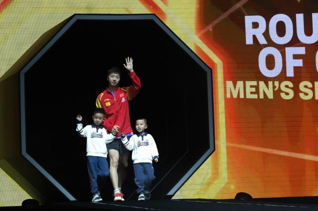 IM电竞-马龙携子亮相大满贯赛场 36岁的老将还想赢还能赢